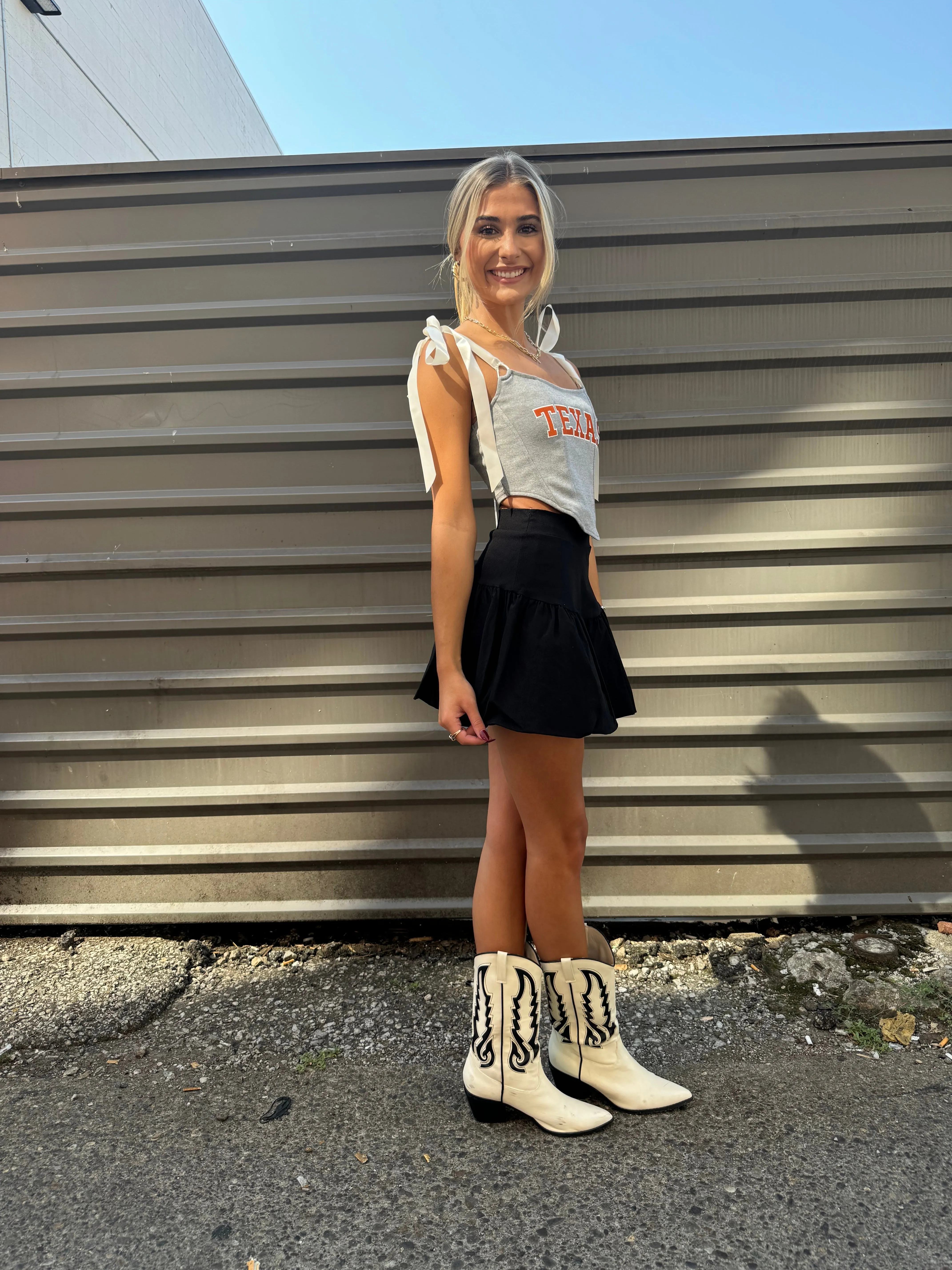 SCHOOLED BUBBLE MINI SKIRT IN BLACK