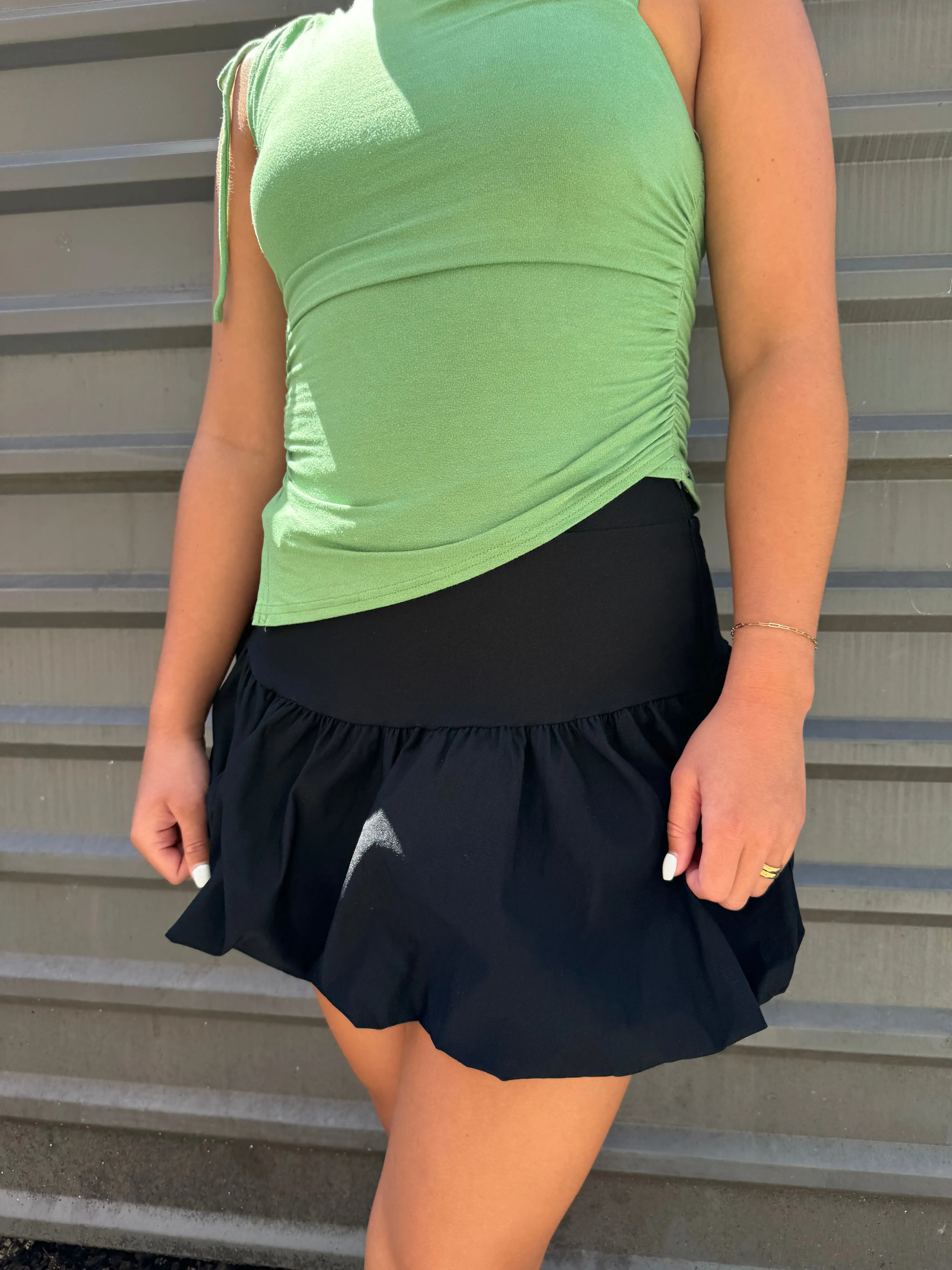 SCHOOLED BUBBLE MINI SKIRT IN BLACK