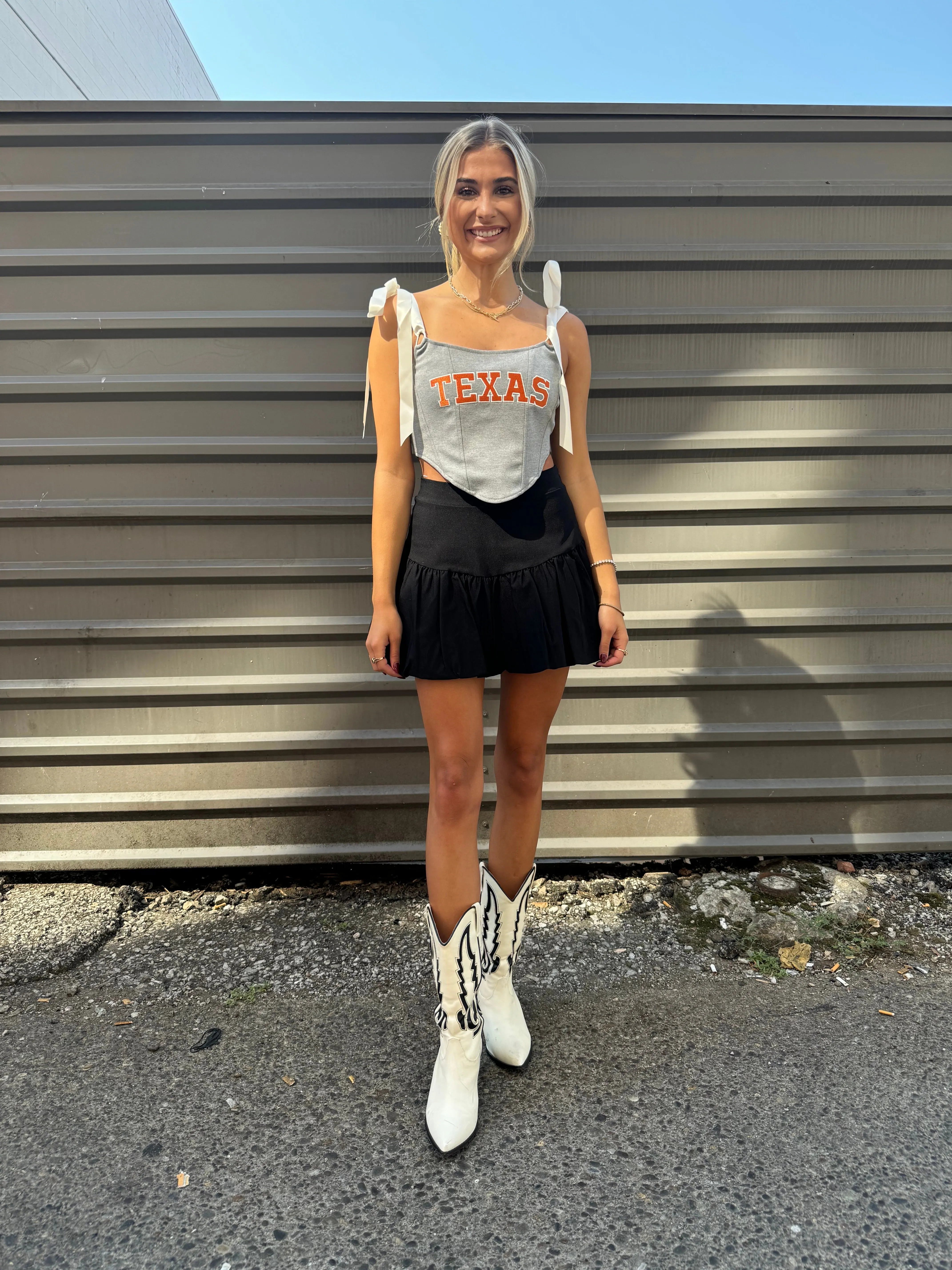 SCHOOLED BUBBLE MINI SKIRT IN BLACK